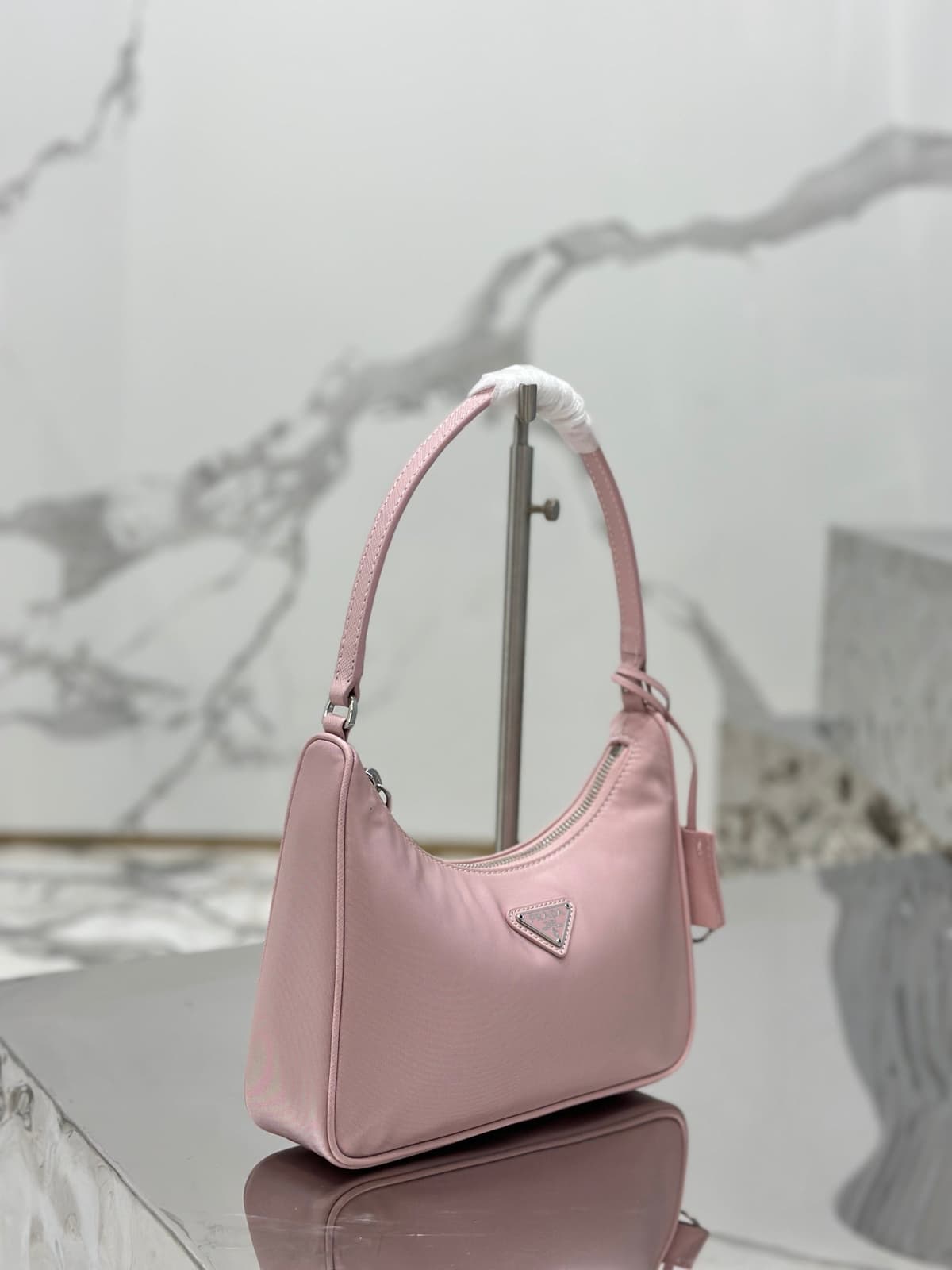 Bolsa Prada mini Re-Edition 2000