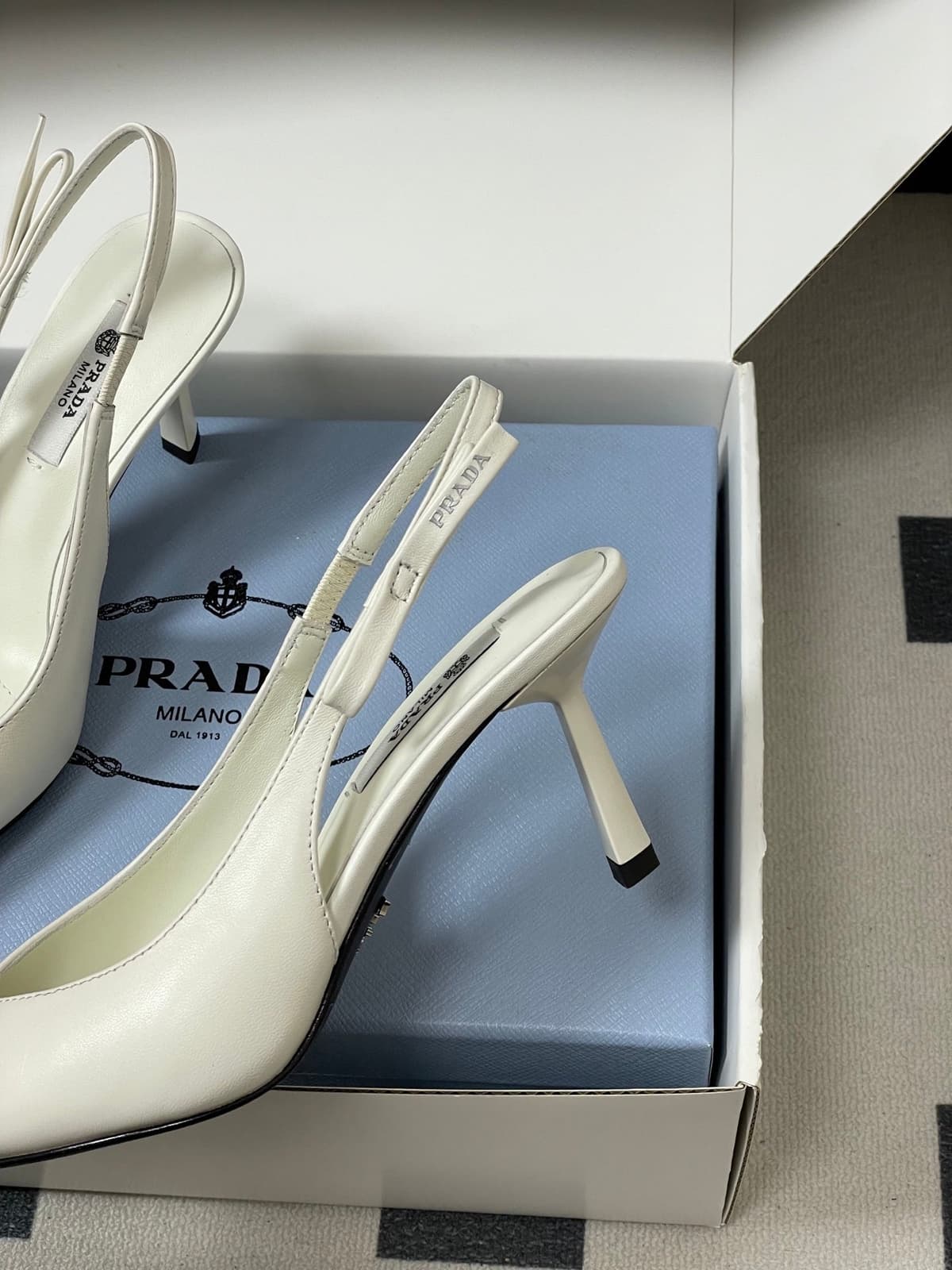 Prada Slingback Pumps White