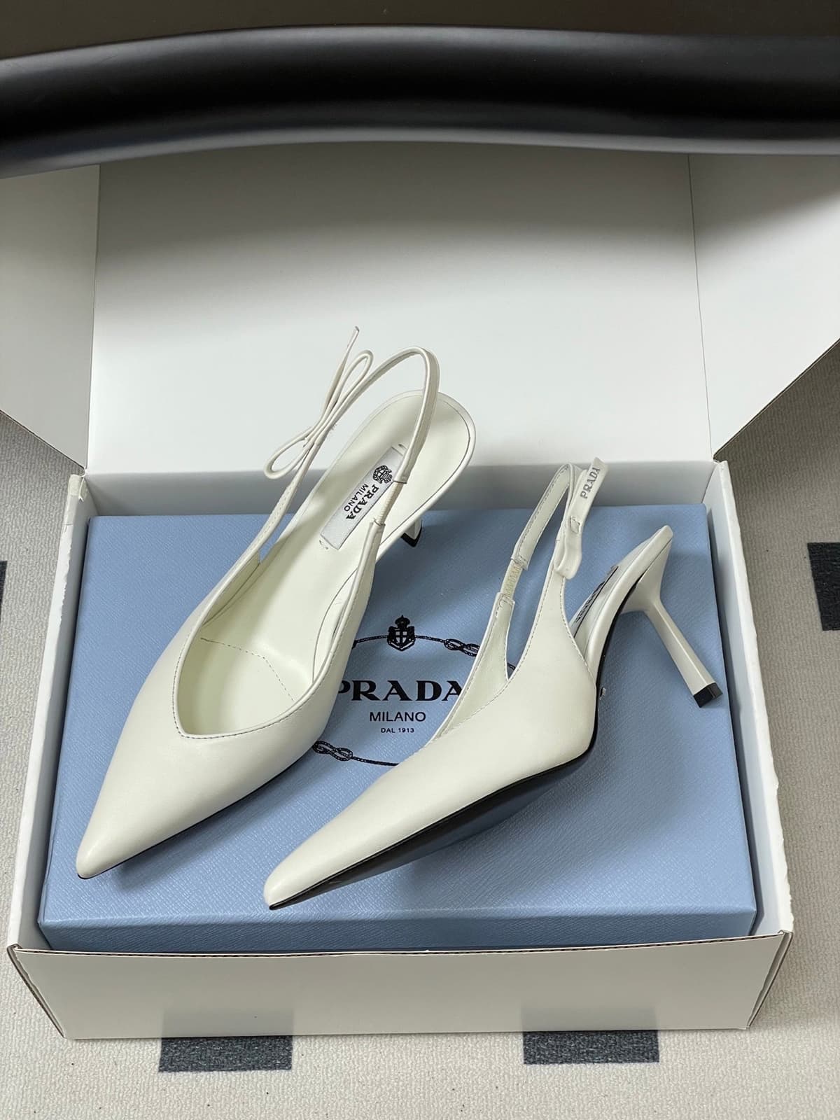 Prada Slingback Pumps White