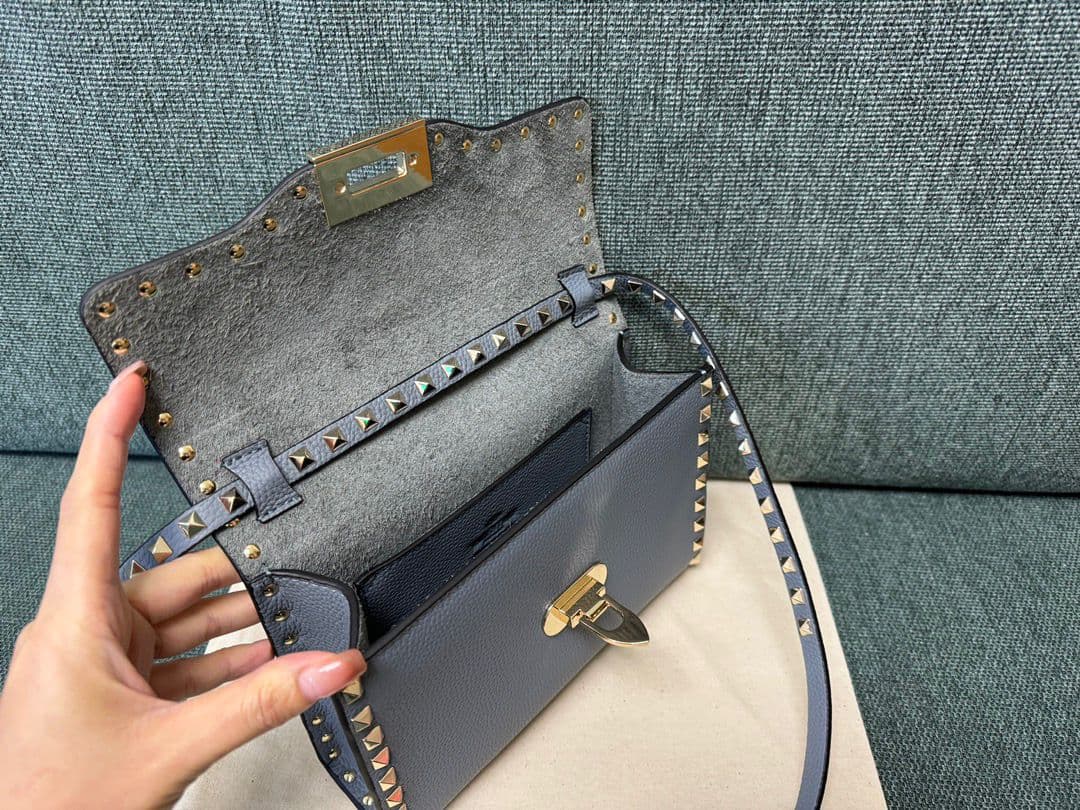 Valentino Garavani Rockstud Small Crossbody Bag Light Blue .