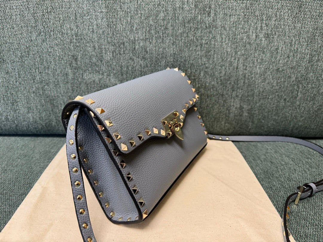 Valentino Garavani Rockstud Small Crossbody Bag Light Blue .